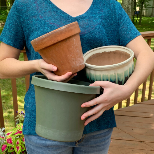holding three different pots